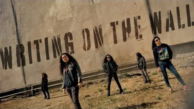 WRITING ON THE WALL